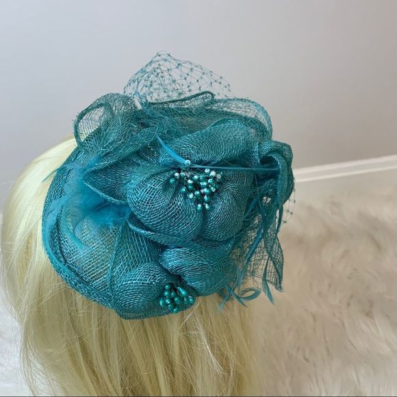 Beautiful turquoise fascinator headband for derby